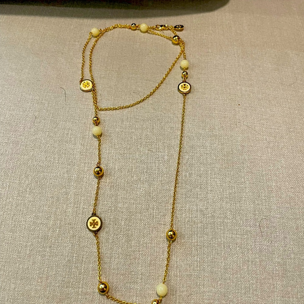 Tory Burch Long Strand Gold Necklace.